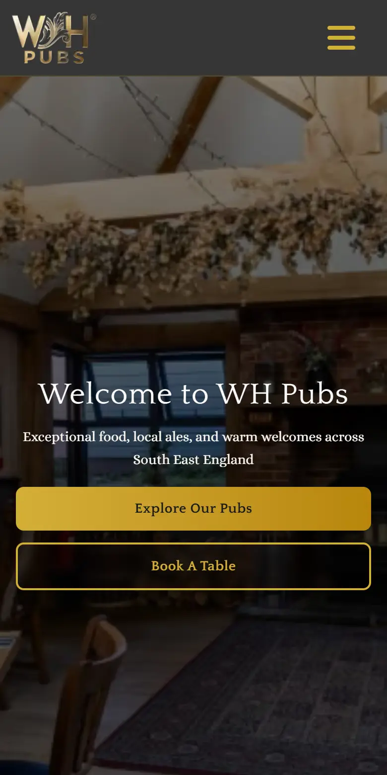 WH Pubs website on a phone